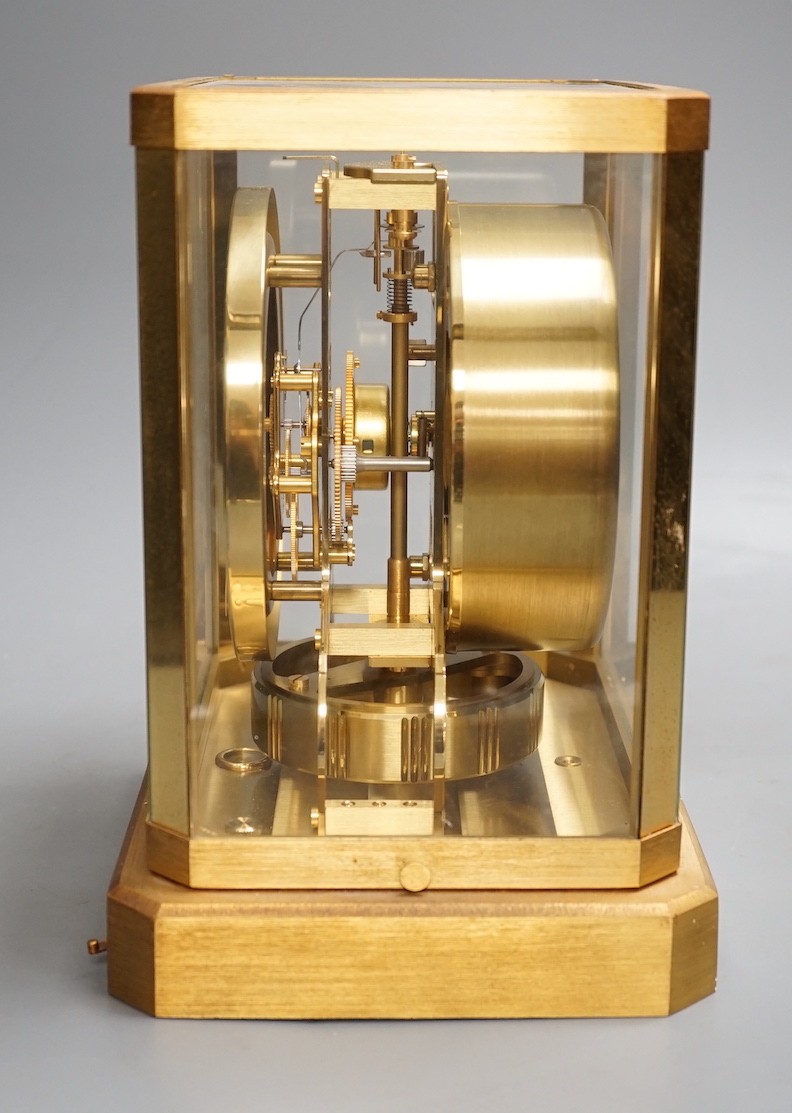 A Jaegar leCoultre Atmos clock with wall bracket